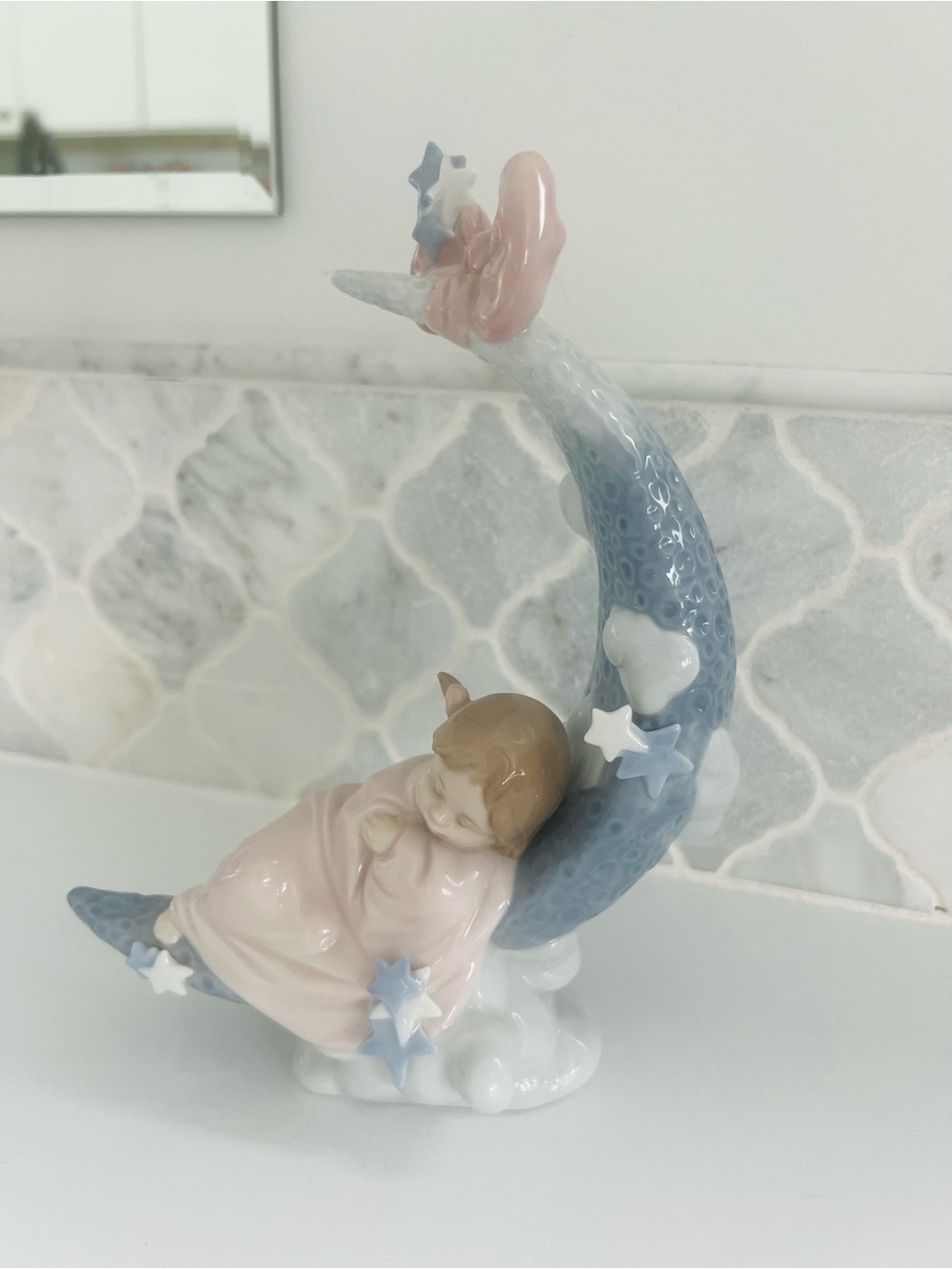 Porcelain Sleeping Child on Crescent Moon Figurine - Blue & Pink